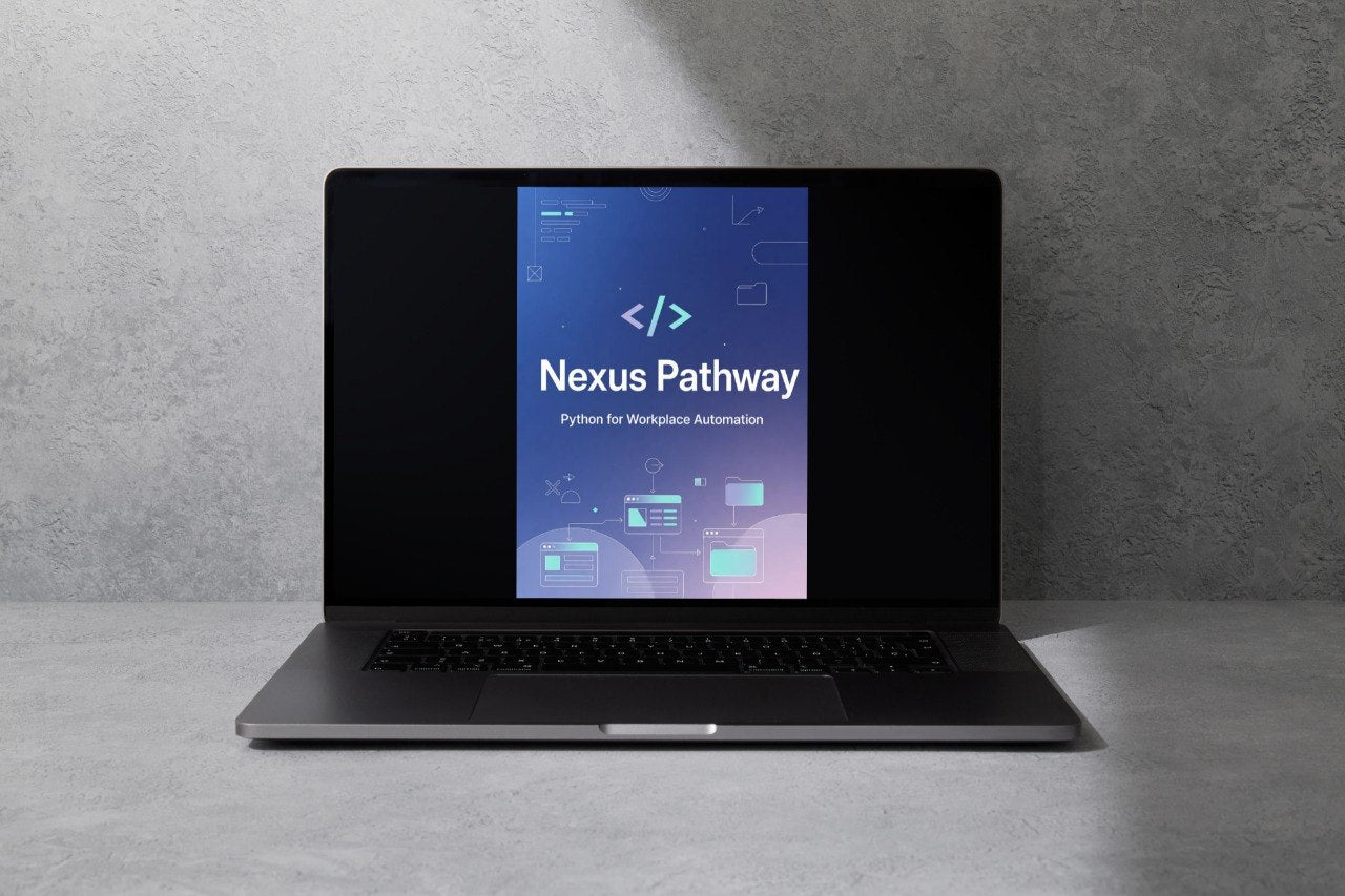 A dark gray laptop sits open on a gray surface against a textured gray wall, with the screen displaying the text 'Nexus Pathway' and a blue-purple interface.